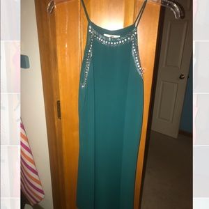 Green embellishes dress